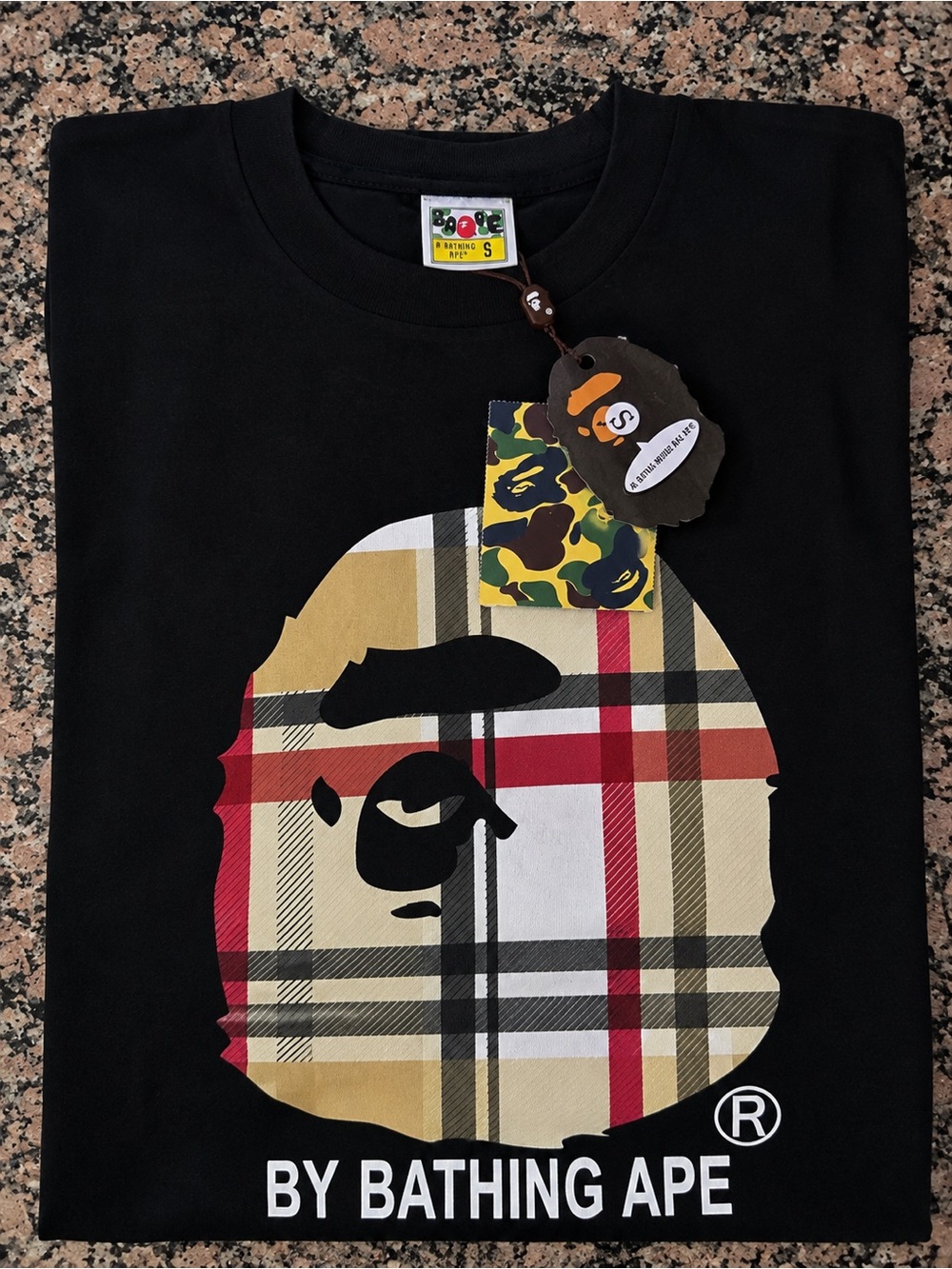 Bape Black Tee with Beige Plaid Ape Head and Red Accents
